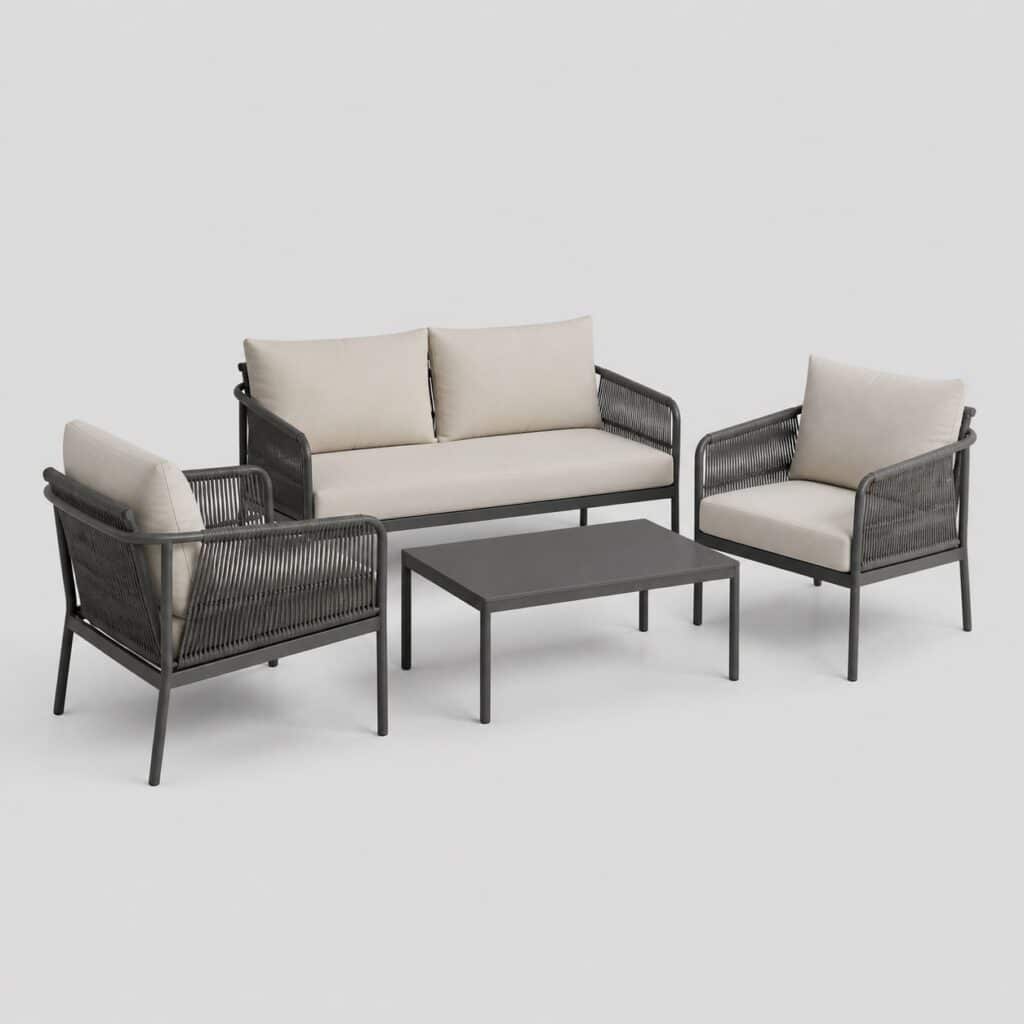 Salon de jardin en aluminium gris anthracite avec coussins clairs sur fond gris clair